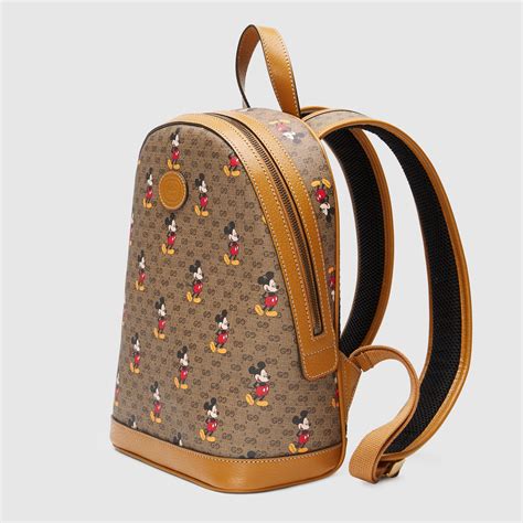 gucci x disney pouch|Gucci X Disney backpack.